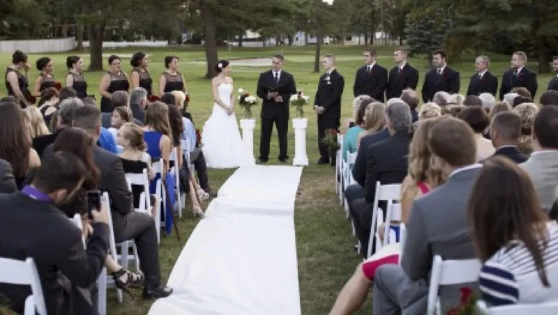 Outdoor wedding ceremony on the Bellevue Golf Club fairway