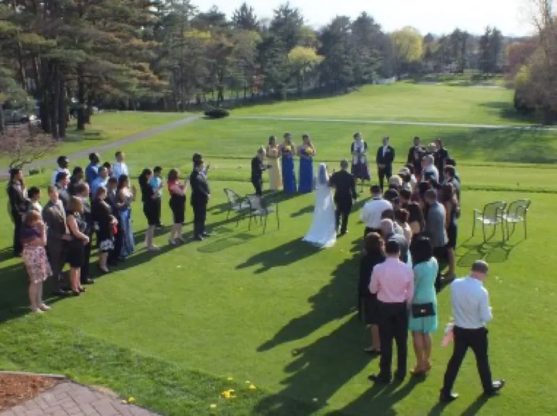 Guests gathering on the Bellevue Golf Club grounds for a ceremony